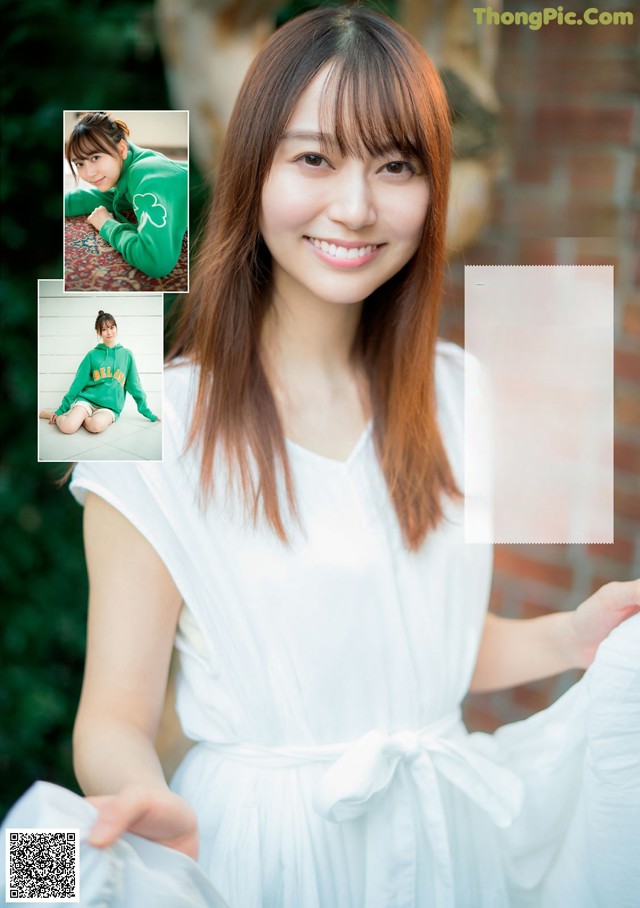 A woman in a white dress posing for a magazine.